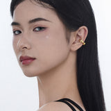 Boucle d'oreille dorée GLENDA en forme de vague