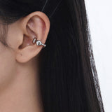 GLENDA silver ear clip in wave shape