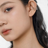 MURRAY Dreireihiger Ohrclip mit knochenartigem Design, 925 Silber